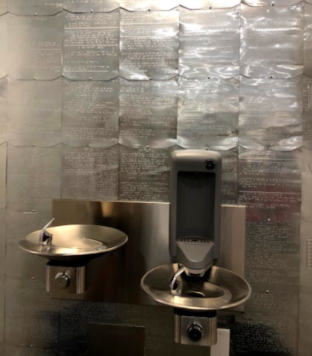 Water fountain with a Braille Math Book as the Back splash